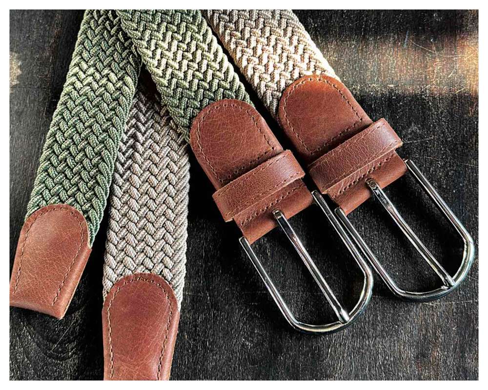 Stretch belts with leather tabs
